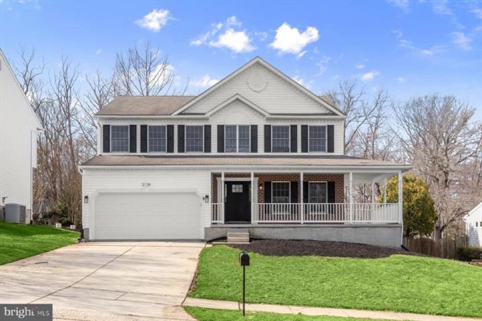A two-storey with a full front porch in Harford County
